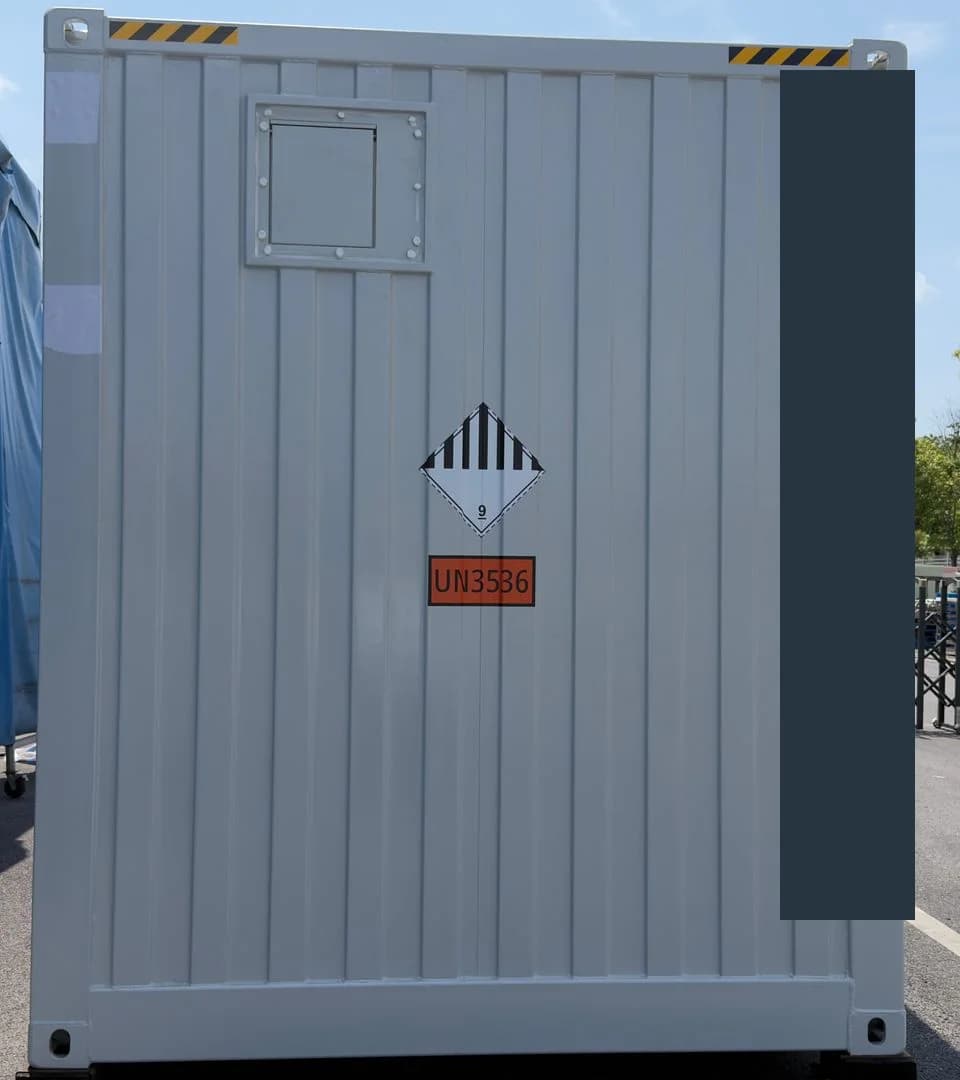 Shipment photograph: enclosure end and UN3536 marking; identifying information masked.